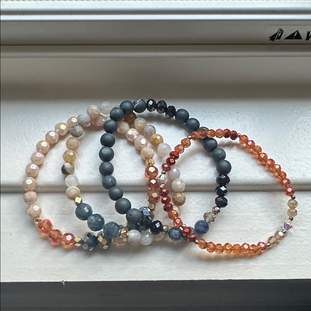 Set of 4 Strechy bracelets made with high quality beads.